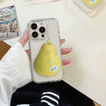 Phone case with a pear design held by a person