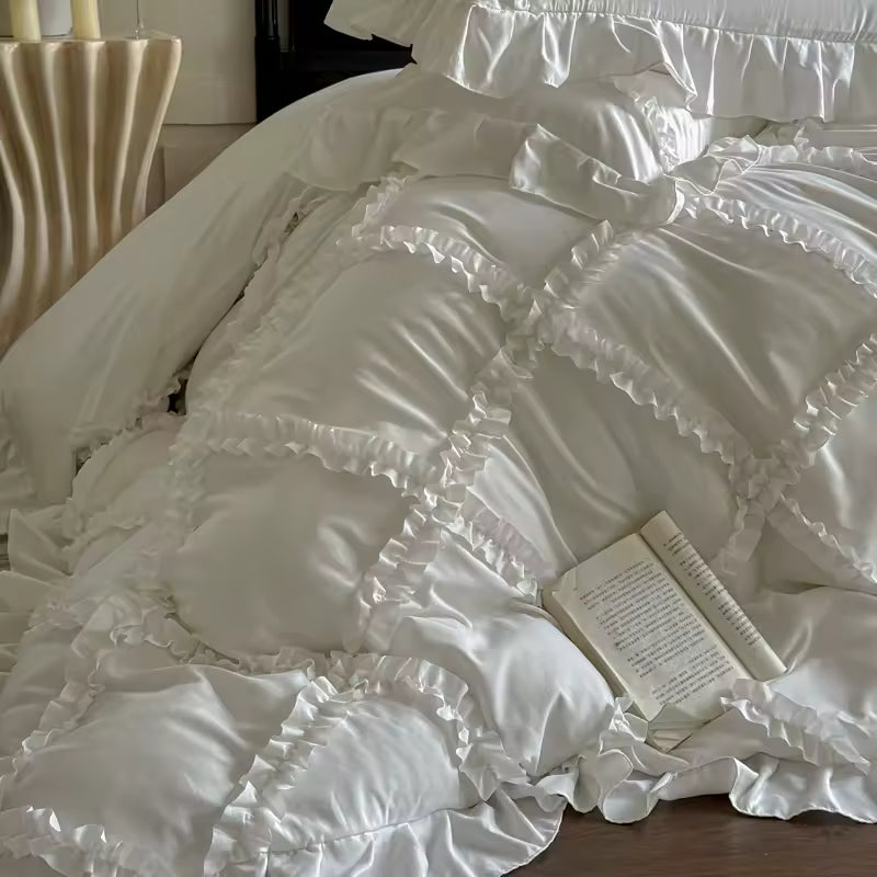 Romantic ruffle duvet cover displayed in a feminine pastel-inspired bedroom.