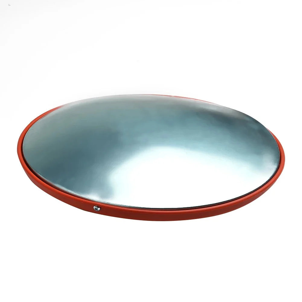 Round metal object with red rim on a white background