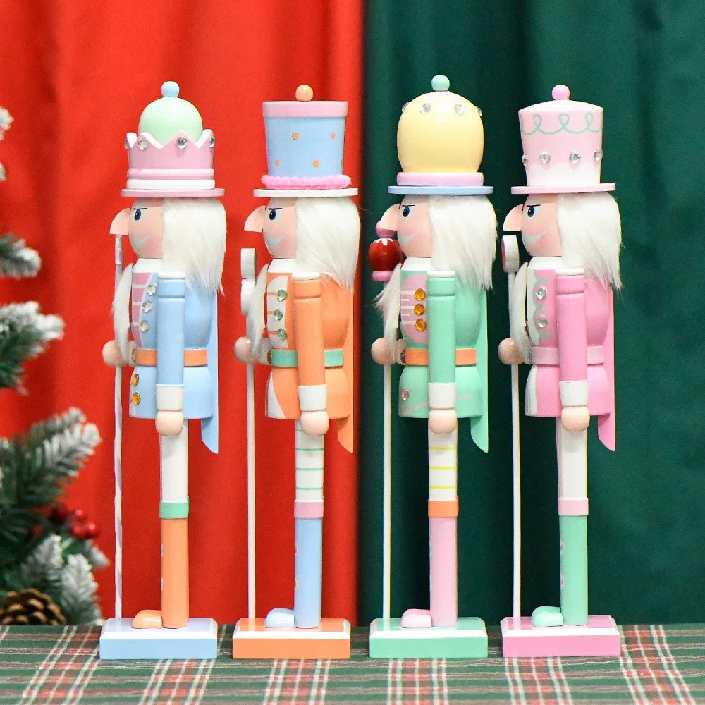 Charming nutcracker figurine with candy series design. Wooden ornament for Christmas tree or holiday home decor.