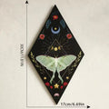 Wooden wall hanging with gothic moon and star designs