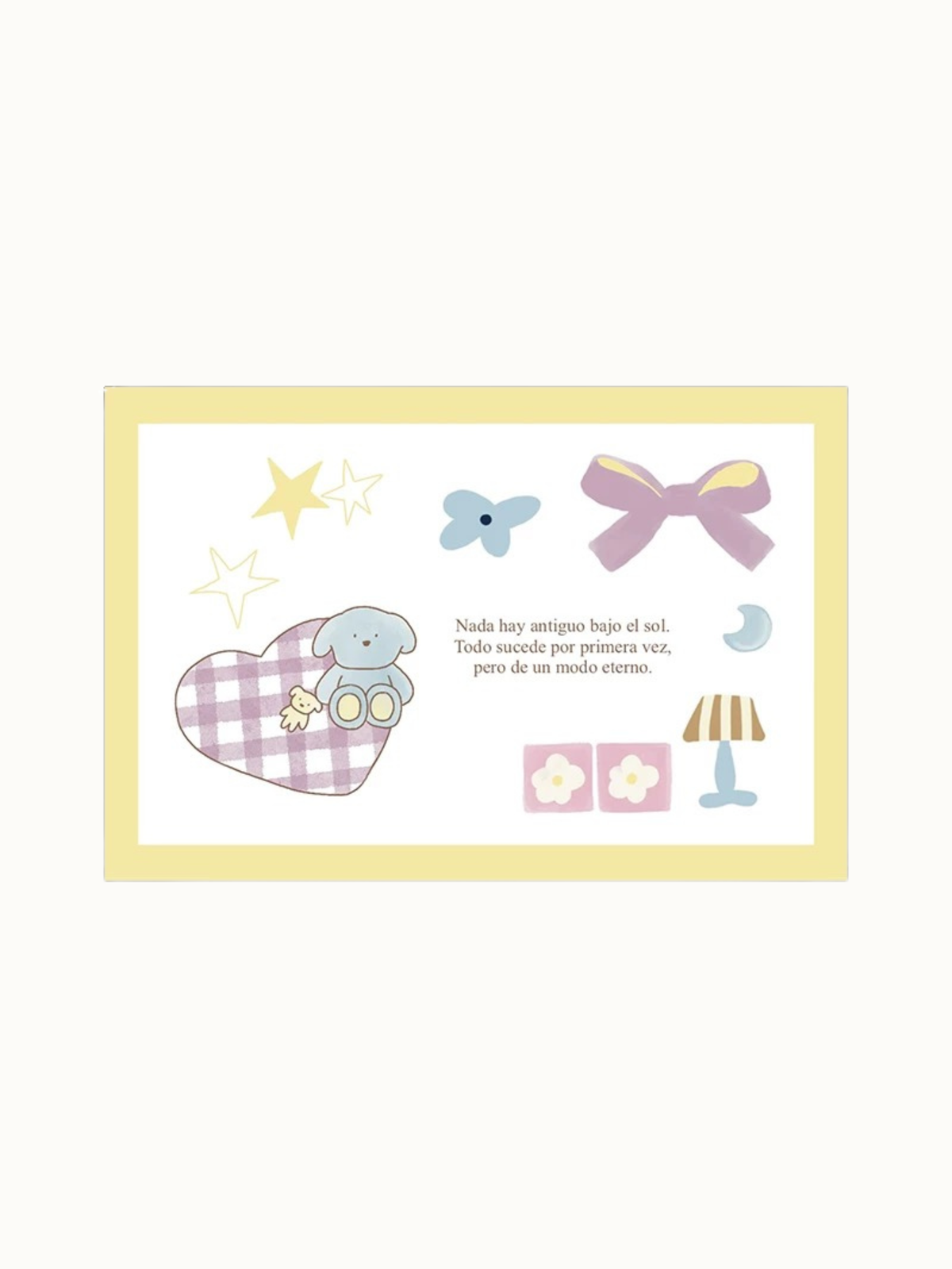 A yellow elephant rug design has a checked heart, a pink bow, small flowers and centered Spanish lettering.
